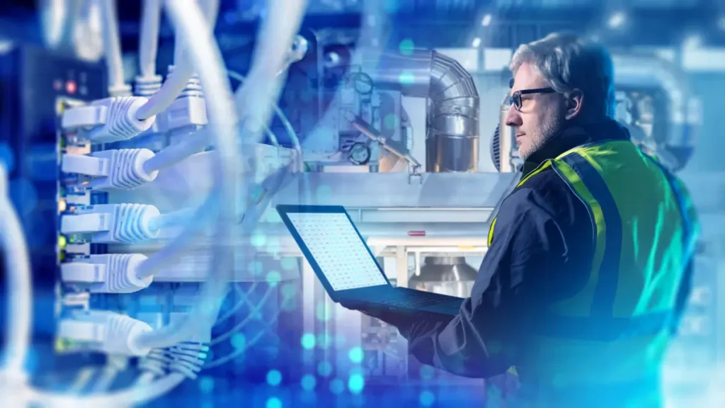 Industrial network engineer monitoring OT protocol traffic across DNP3, OPC UA, Modbus, and IEC 61850 systems