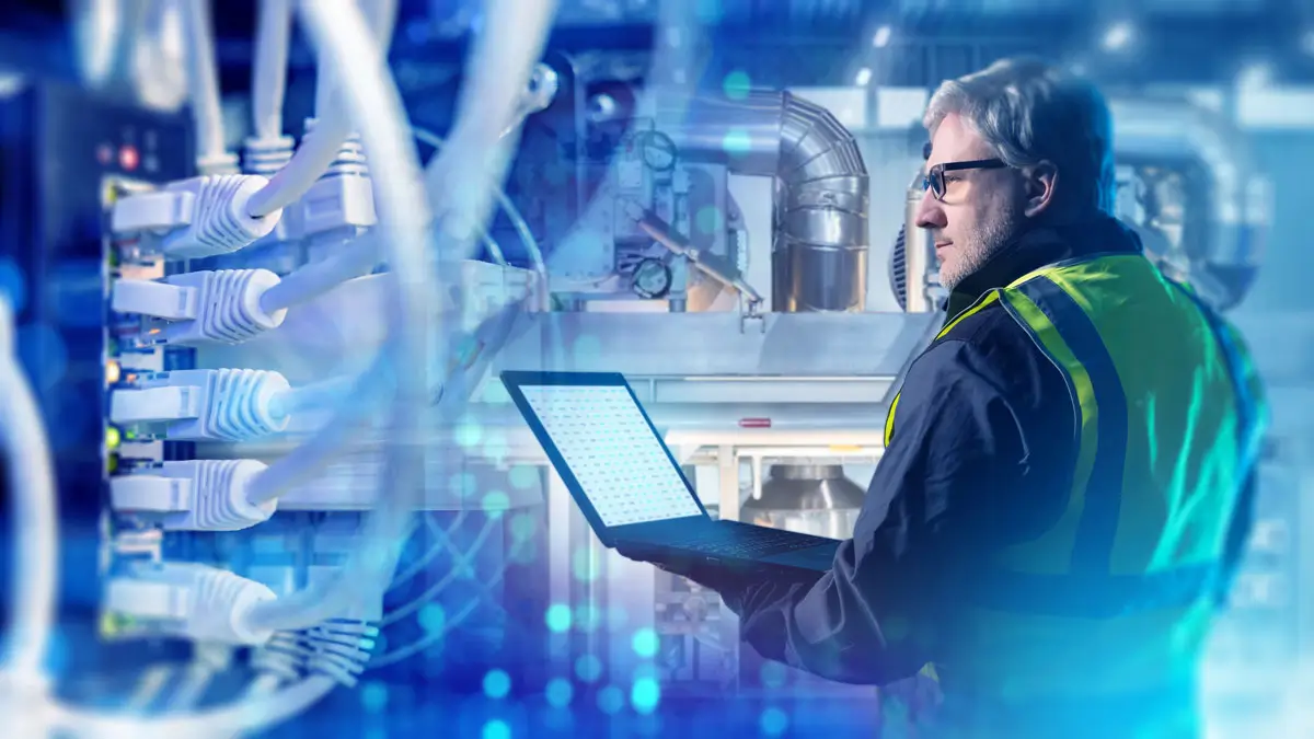 Industrial network engineer monitoring OT protocol traffic across DNP3, OPC UA, Modbus, and IEC 61850 systems